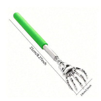 Metal back scratcher with green handle on a white background