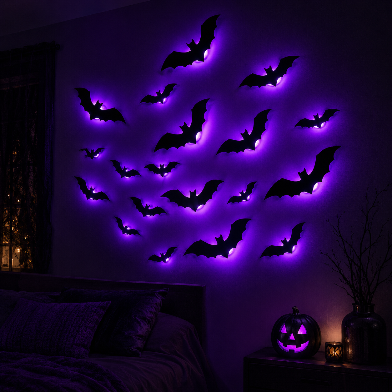 Halloween wall decor featuring multiple black bat silhouettes with glowing purple LED backlighting, displayed on a bedroom wall above a bed.