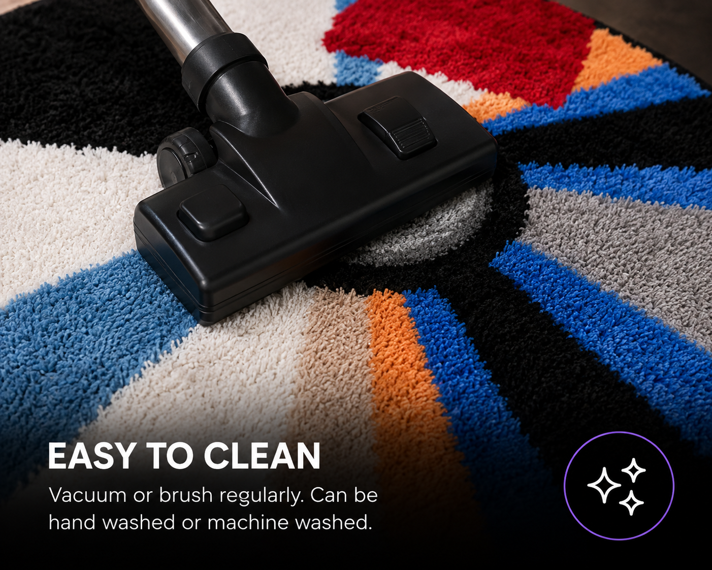 A close-up of a black vacuum head cleaning a colorful high-pile rug with text reading 'EASY TO CLEAN' and a small sparkle icon in the corner.