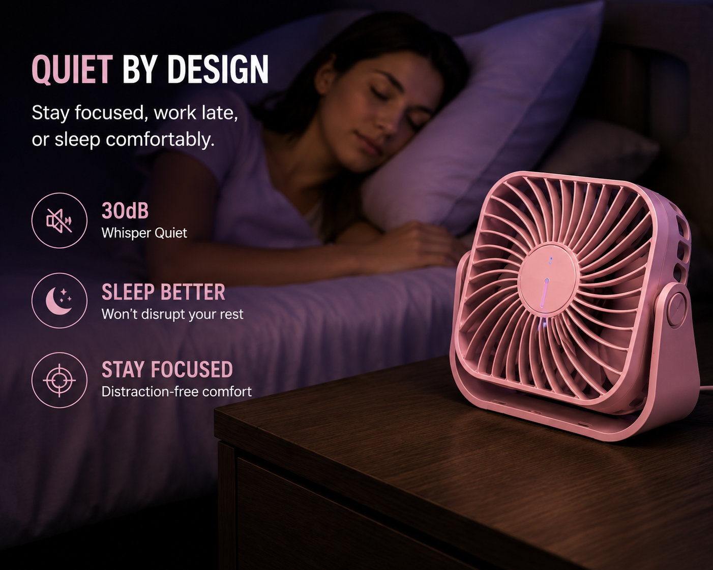 A pink portable desk fan sits on a wooden nightstand beside a bed, with a woman sleeping soundly in the background. The image includes marketing text reading 'QUIET BY DESIGN' and feature callouts for 30dB whisper quiet and sleep better.