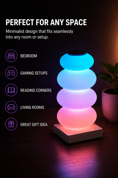 A glowing stackable LED lamp with four rounded tiers on a square base, shown on a dark tabletop in a room setting. Text on the left reads 'PERFECT FOR ANY SPACE' with suggestions for bedroom, gaming setups, reading corners, and living rooms.