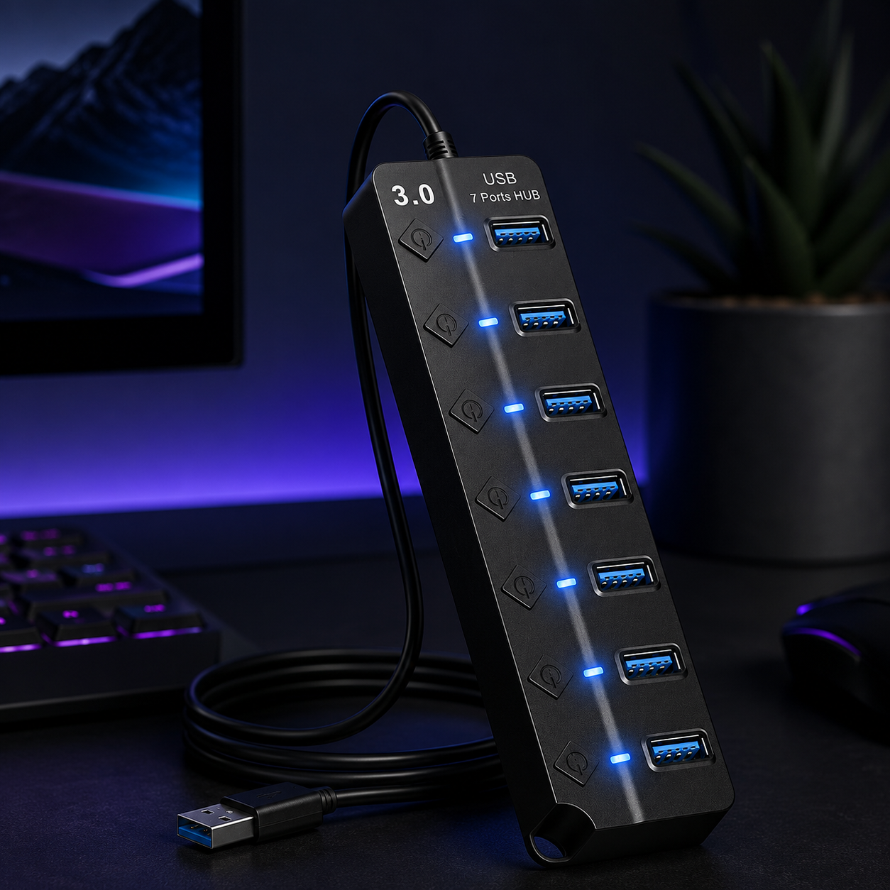 A 7-port USB 3.0 power strip with blue-lit ports, shown standing on a desk in a dimly lit room with a keyboard, monitor, and plant in the background.